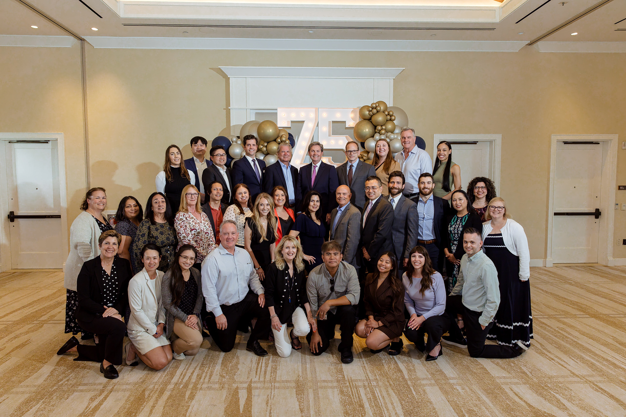 Cummins & White attorneys and staff celebrate the firm’s 75th Anniversary at Newport Beach Country Club.