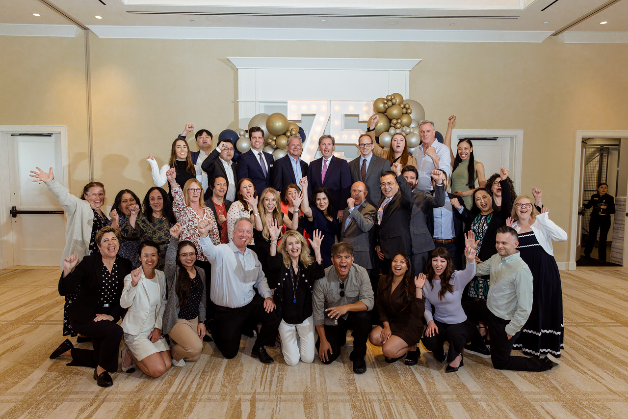 Cummins & White, LLP celebrating their 75th Anniversary at Newport Beach Country Club.